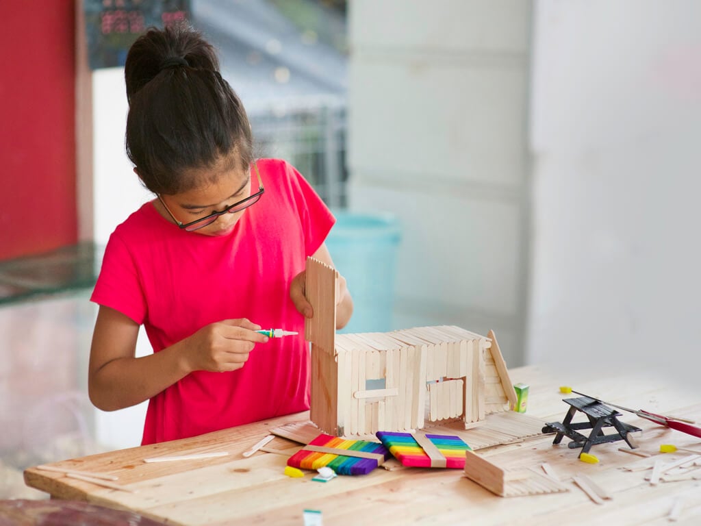 young girl doing math stem activities